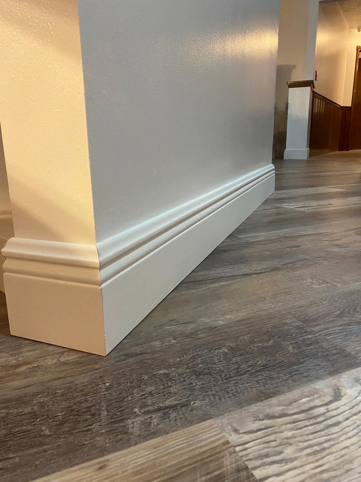 Baseboard trim installation alongside new flooring, Orlando FL