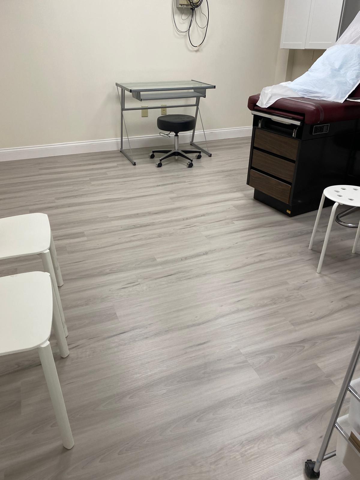 Medical office LVP installation detail close-up