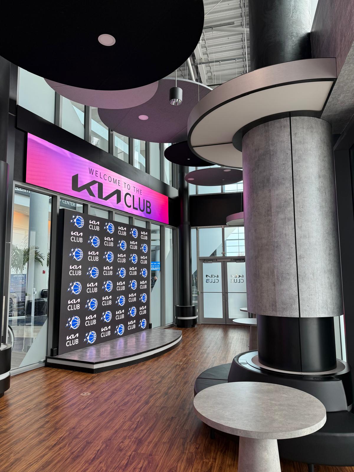 Kia Club LVP flooring installation detail at Kia Center in Orlando