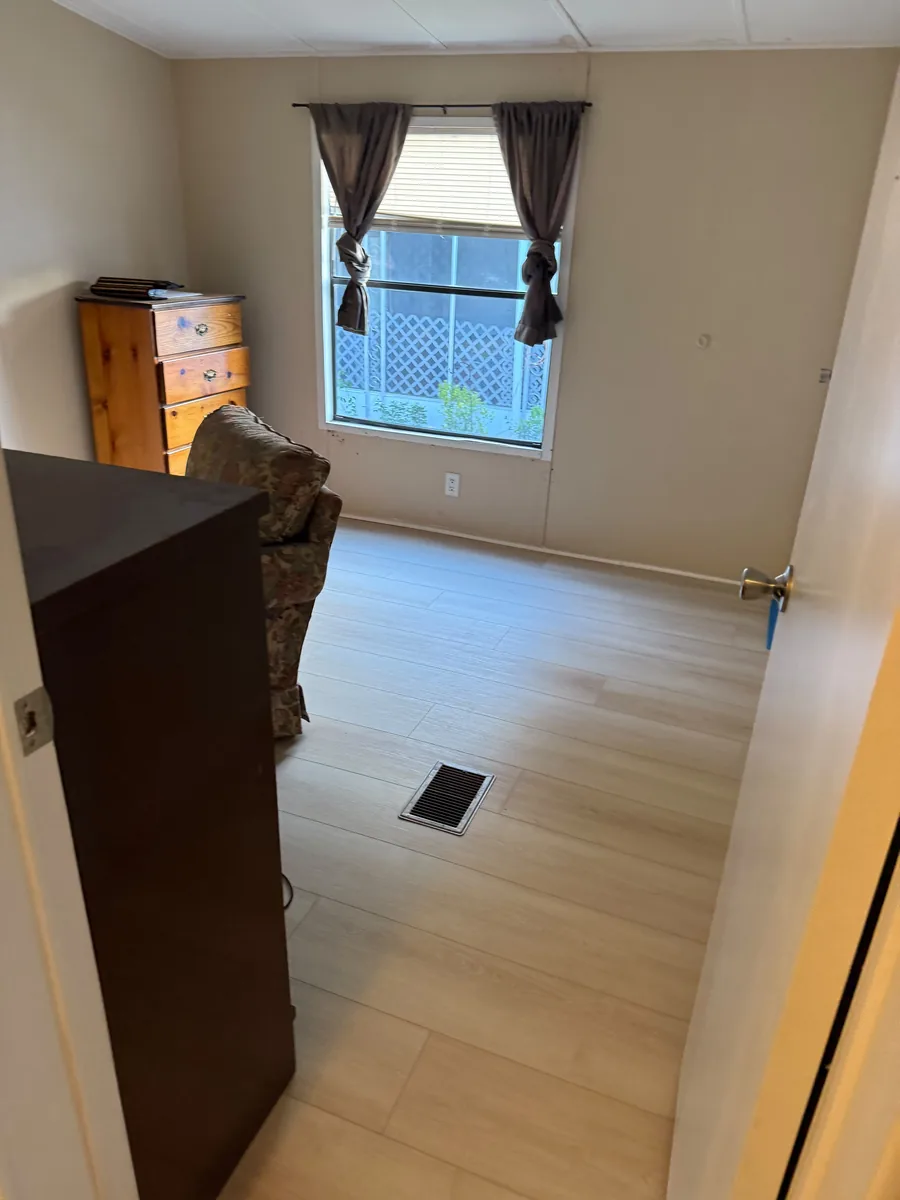 Completed vinyl flooring in a Winter Garden bedroom