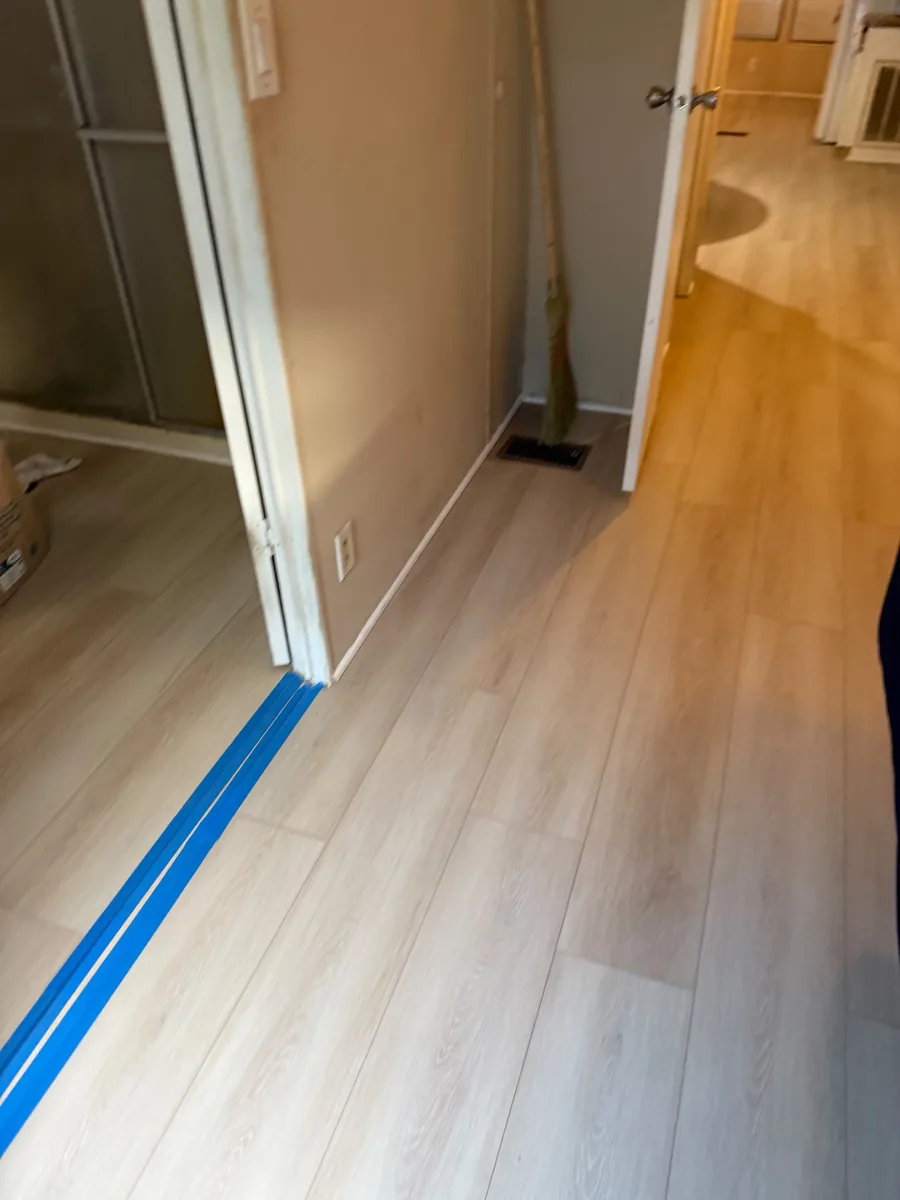 Completed vinyl flooring at a Winter Garden hallway doorway