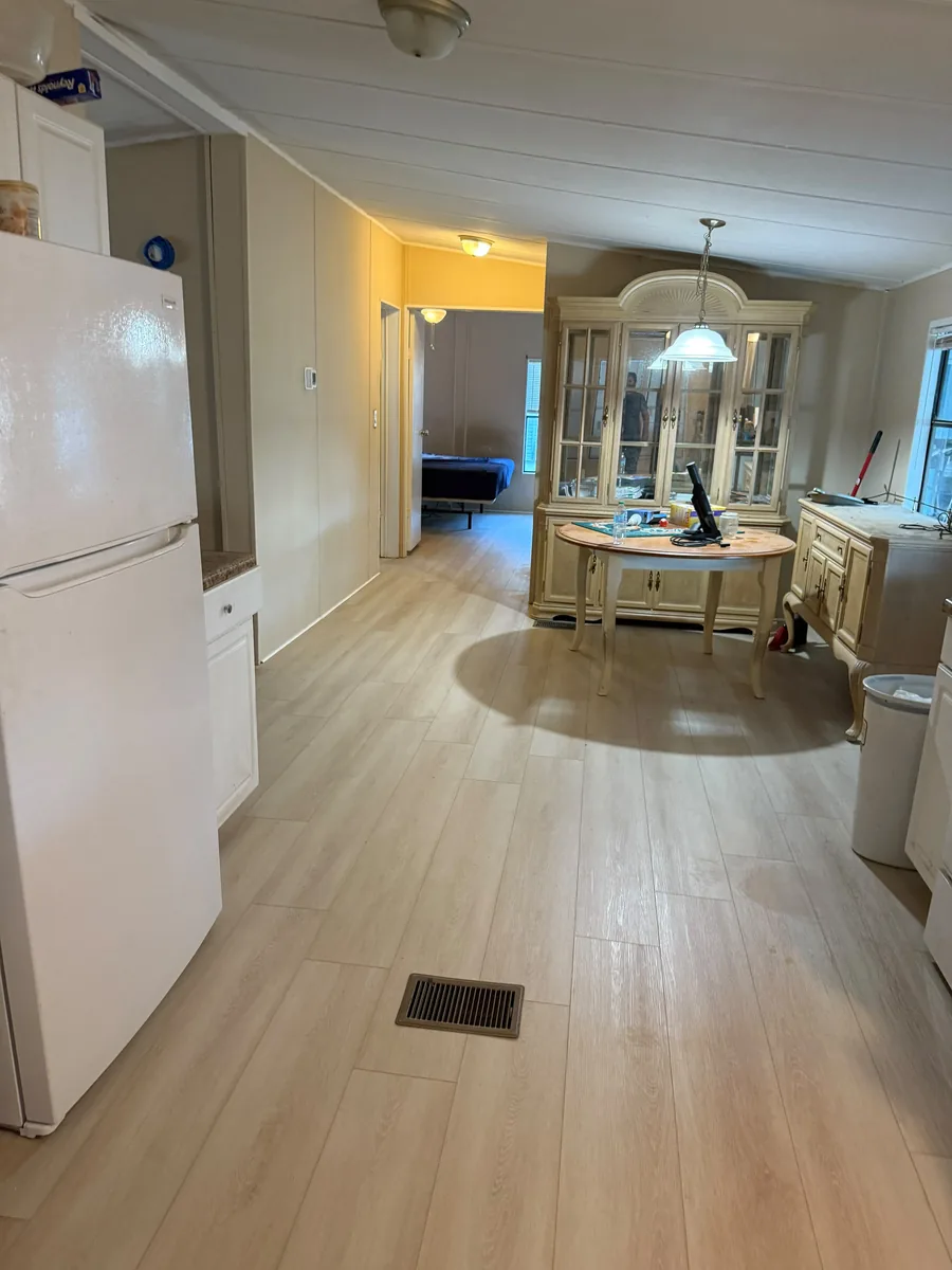 Completed vinyl flooring across a Winter Garden kitchen and dining area