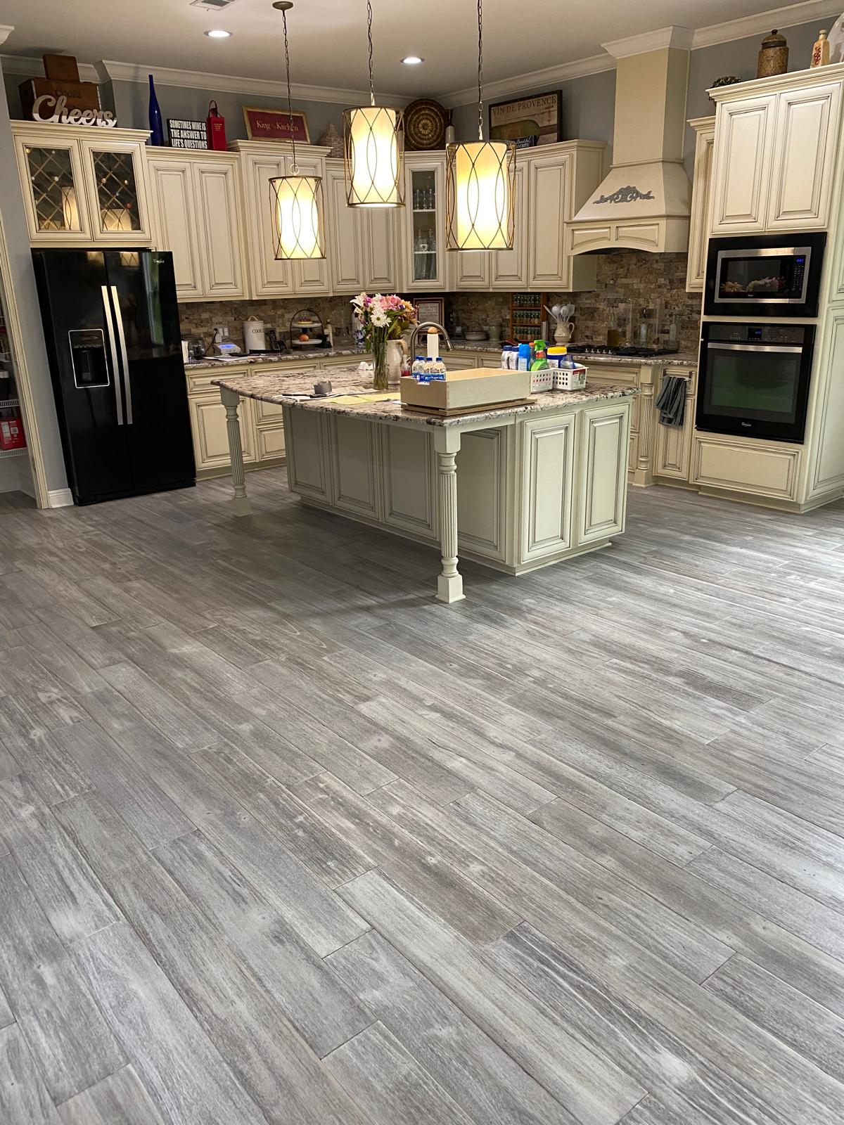 Solid hardwood glue-down installation in gourmet kitchen, Orlando FL