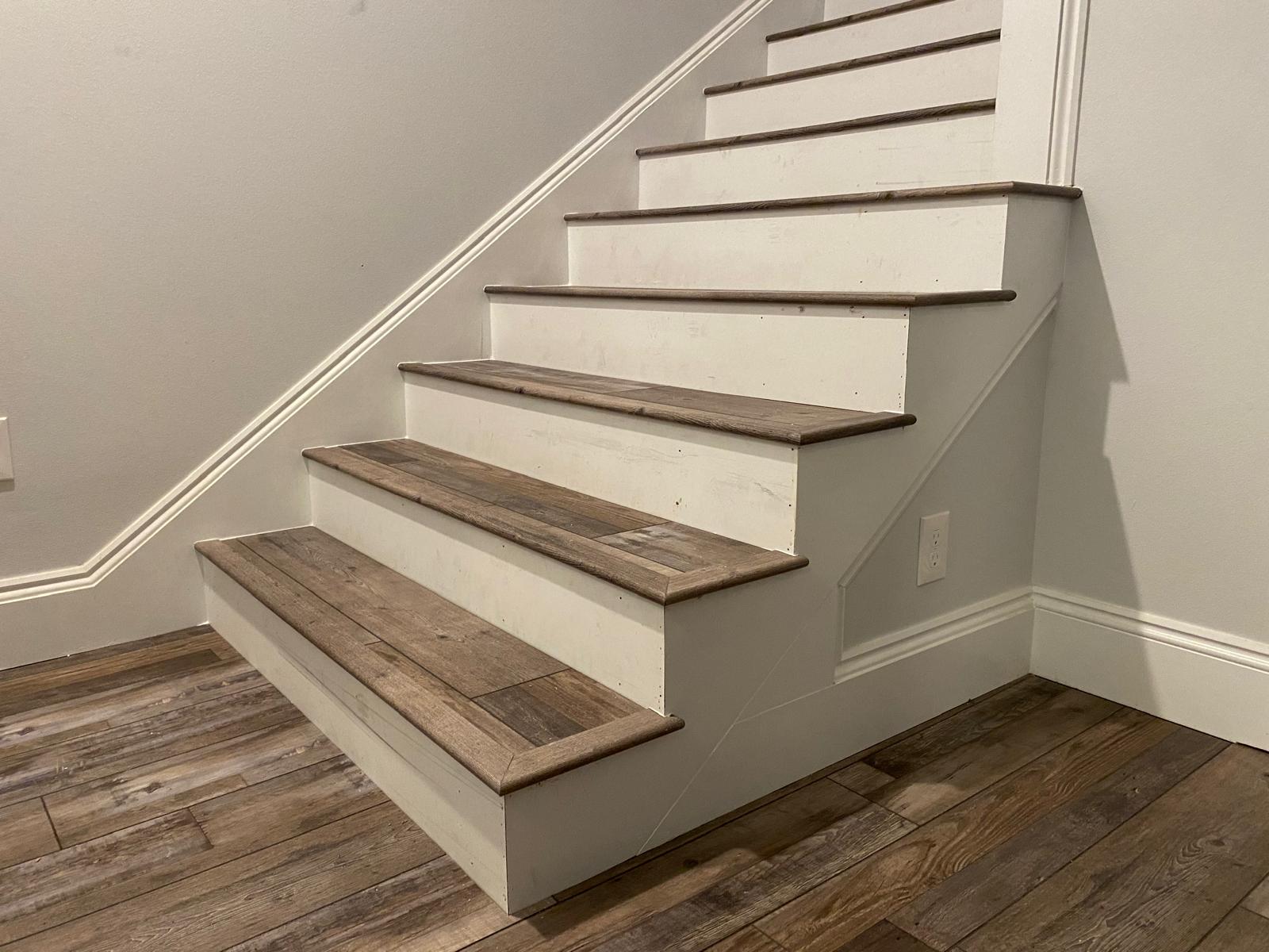 LVP stair tread installation with white risers, Orlando FL