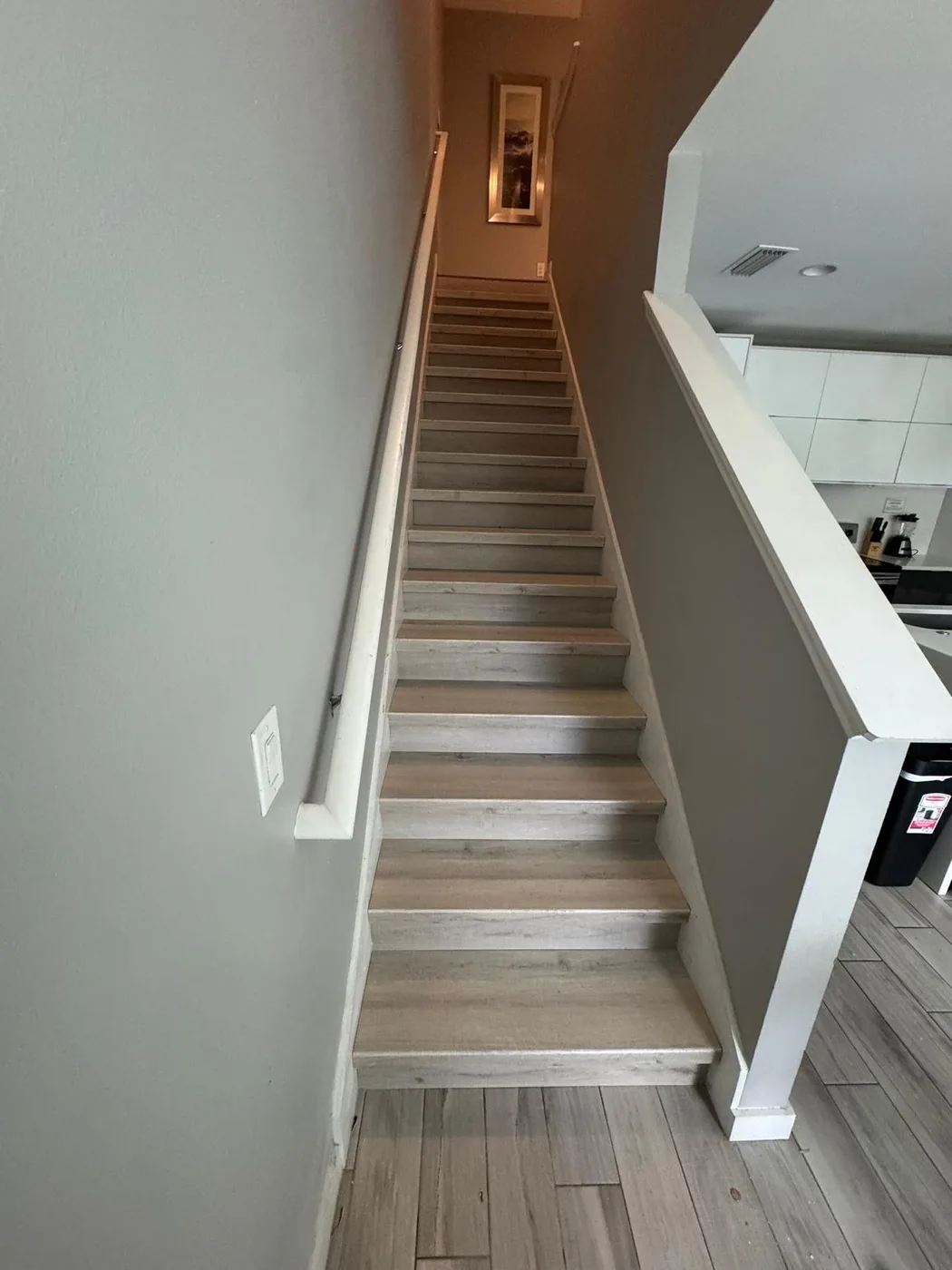 Completed LVP stair installation in Orlando home