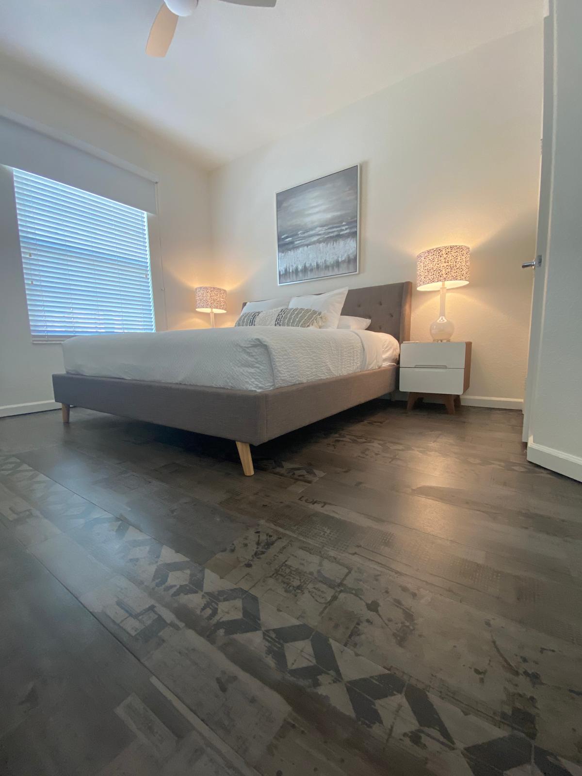 Dark charcoal LVP bedroom
