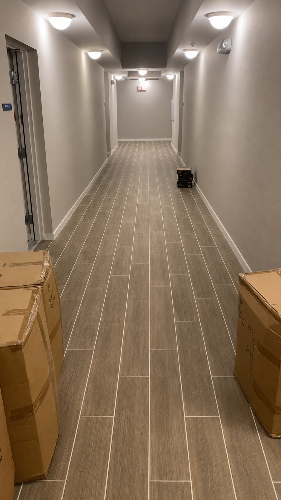 Vista Cay Resort commercial porcelain tile hallway installation