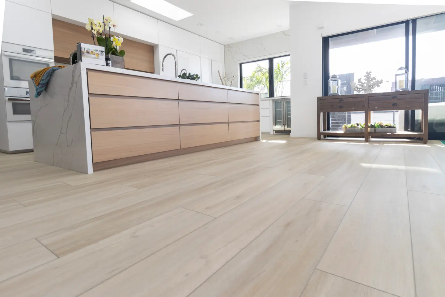 Dawn Patrol Legends luxury vinyl plank flooring in an Orlando room with color-coordinated transitions and trim